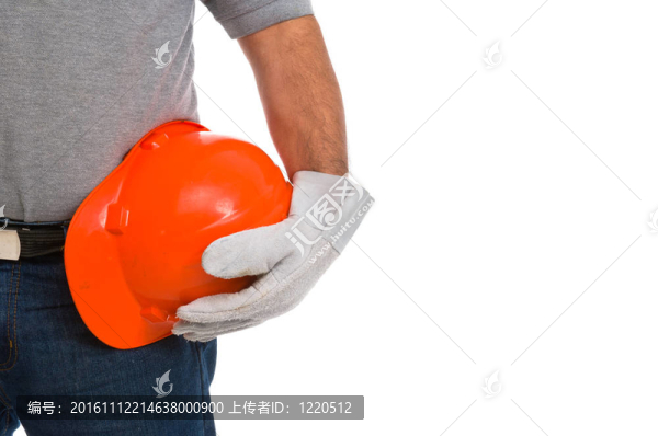 工人手上戴著頭盔戴上手套
