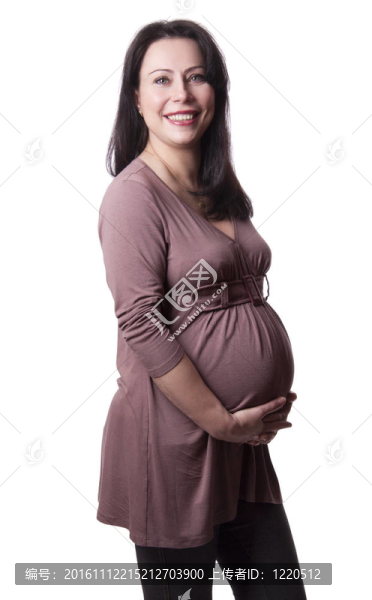 成人孕婦用手在腹部