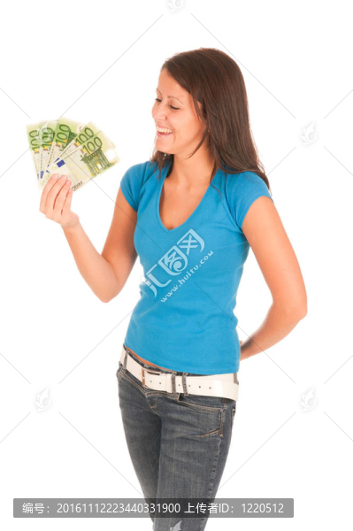 漂亮的年輕女孩手里拿著鈔票