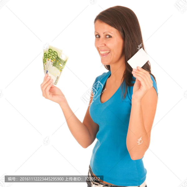 漂亮的年輕女孩手里拿著鈔票
