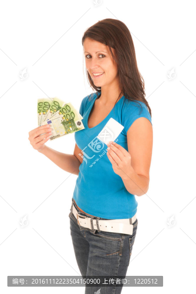 漂亮的年輕女孩手里拿著鈔票