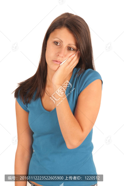 一個(gè)迷人的年輕婦女患牙痛的孤立畫(huà)像