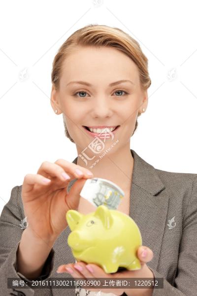 可愛的女人與儲(chǔ)蓄罐和錢