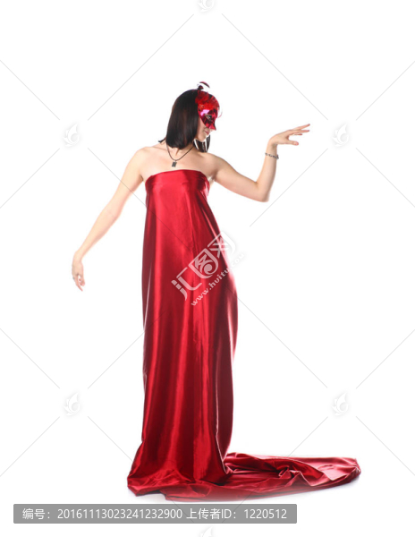 穿著紅色連衣裙和面具的女人
