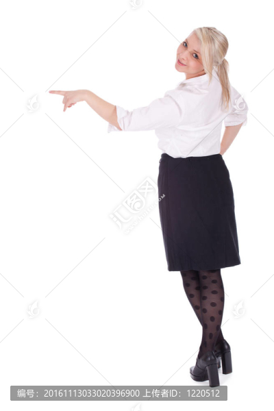微笑優(yōu)雅的襯衫指著年輕女商人或老師