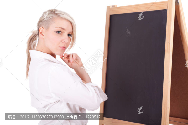 認(rèn)真年輕漂亮的女老師帶黑板