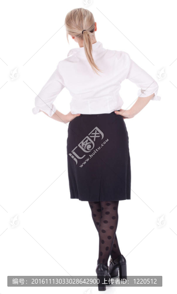 站在后面的女商人或教師在優(yōu)雅的衣服