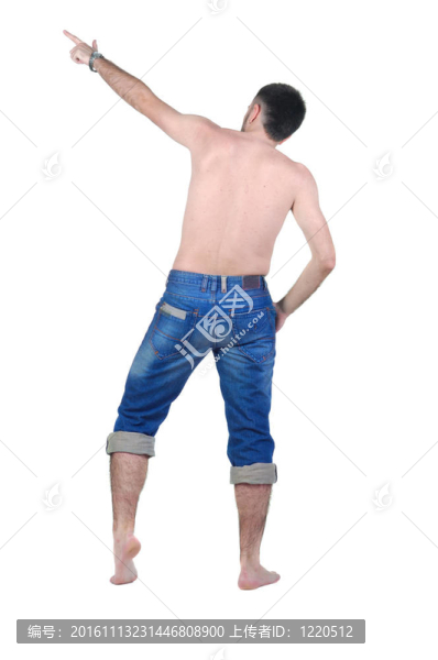 seminyde年輕人指著墻。后視圖。