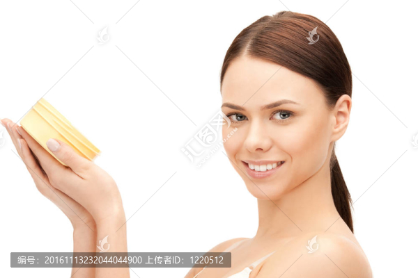 美麗的女人用保濕霜