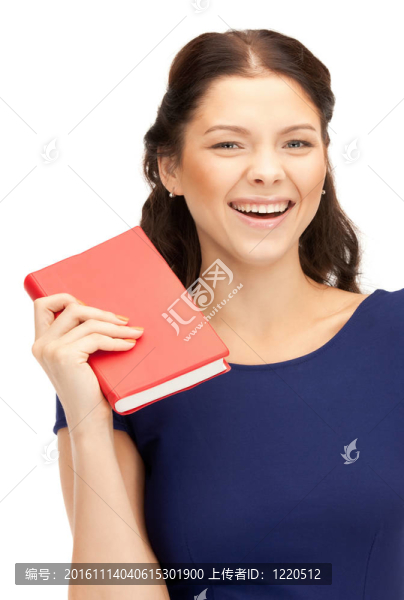 幸福和微笑的女人帶著書