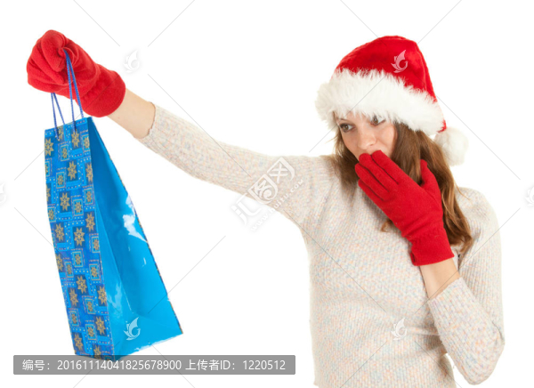 穿著Santa帽子的女孩帶著圣誕禮物拎著購(gòu)物袋；白色背景
