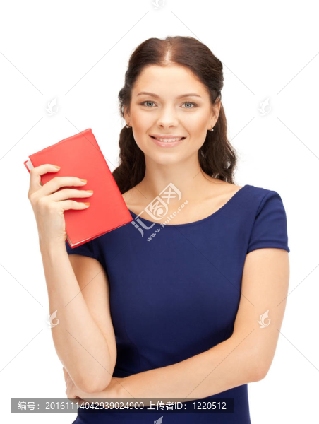 幸福和微笑的女人帶著書