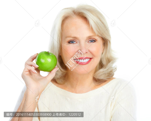 女人與一個綠色的蘋果
