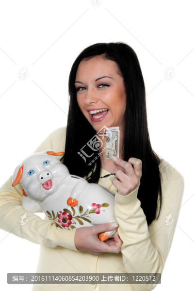 女人存錢罐和美鈔。節(jié)約