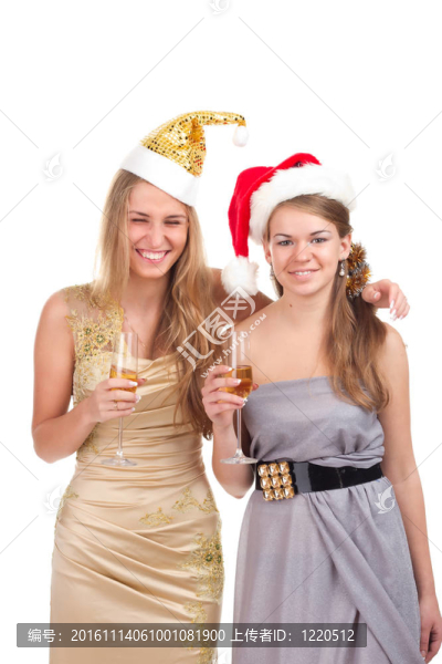 兩個(gè)女孩用手拿禮物和眼鏡慶祝圣誕節(jié)