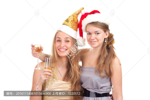 兩個(gè)女孩用手拿禮物和眼鏡慶祝圣誕節(jié)