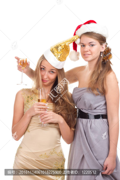 兩個女孩用手拿禮物和眼鏡慶祝圣誕節(jié)