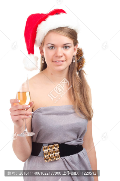 女孩用一杯酒慶祝圣誕節(jié)