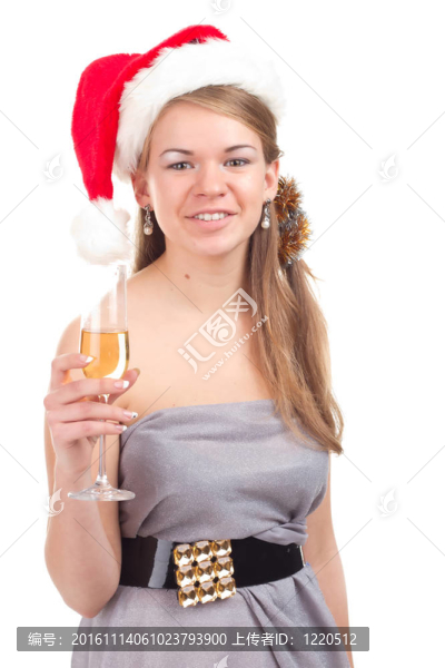 女孩用一杯酒慶祝圣誕節(jié)