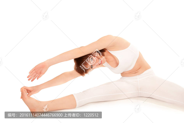 年輕美麗的體操運動員伸展