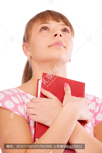 美麗的年輕夢女人與書