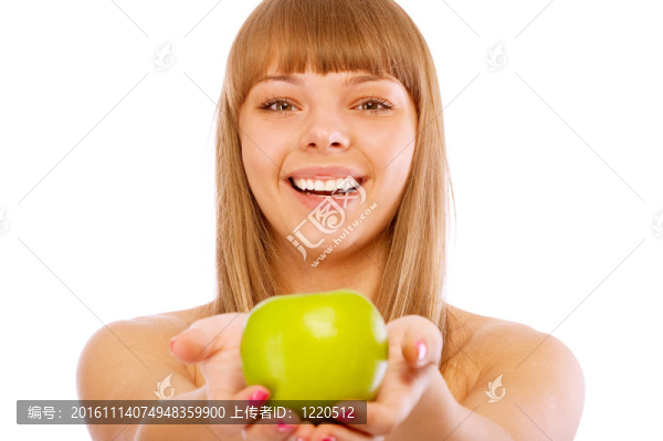 美麗的女人拿著蘋果
