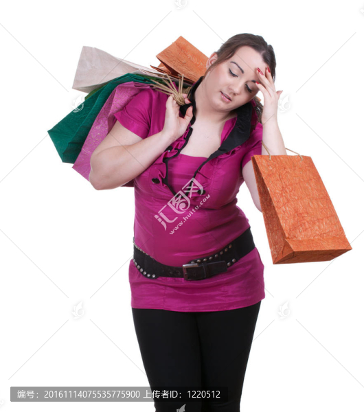 疲憊的胖女人帶購(gòu)物袋
