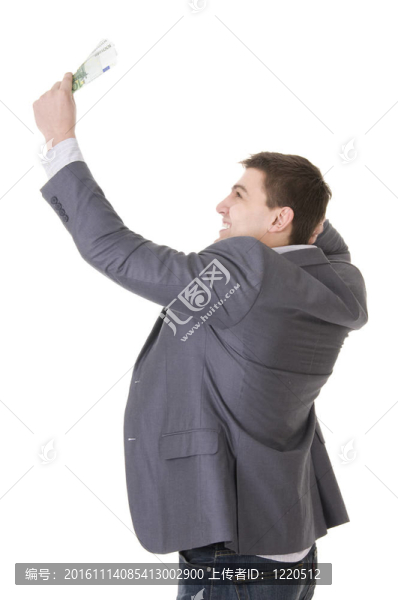 快樂的年輕商人拿著錢