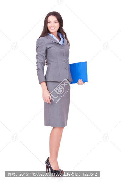 商業(yè)婦女站在她的剪貼板-匯圖網(wǎng) www.fosd68.com 商業(yè)婦女站在她的剪貼板