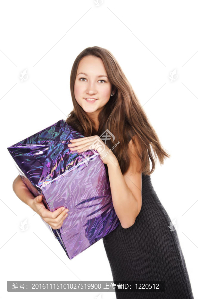 帶禮品盒的快樂女孩
