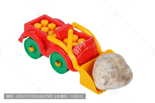 拖拉機玩具和石頭