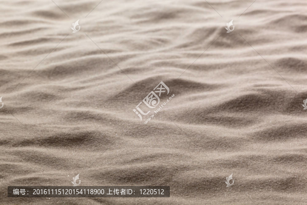 海灘上的沙子。背景