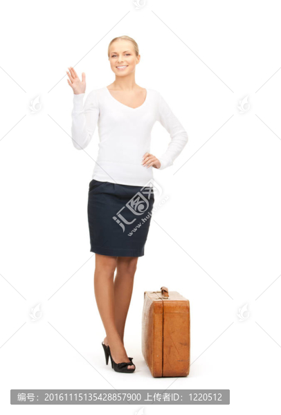 漂亮的女人，棕色的手提箱
