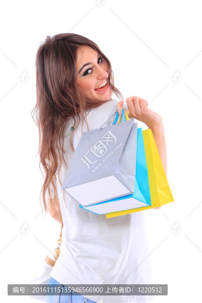 可愛的女人與購物袋