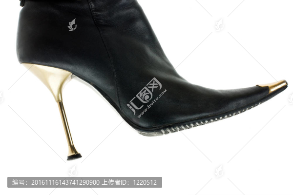 白色背景下的女性靴子照片