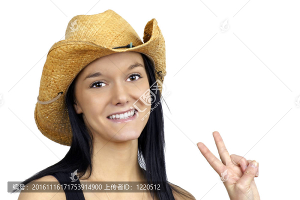 漂亮的女牛仔制造和平的標(biāo)志