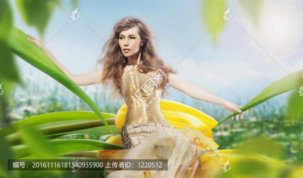 坐在郁金香上的美麗的年輕女士