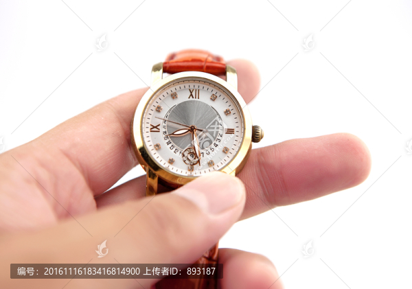 手中的腕表,拿著