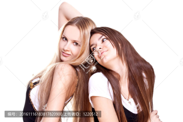 兩個美麗的女人在一套西裝