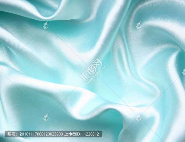 以流暢的優(yōu)雅的藍色絲綢為背景