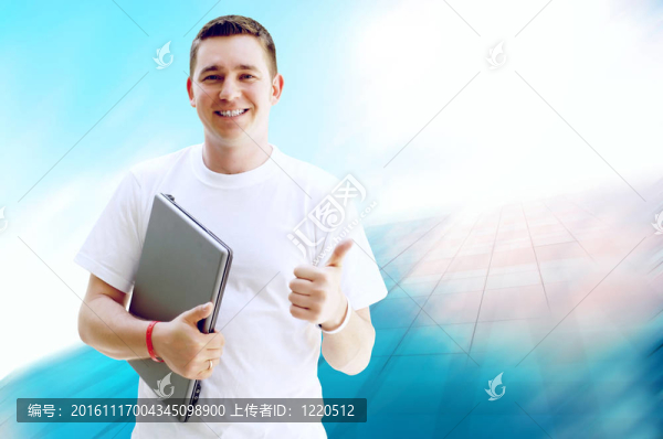 年輕快樂的人或?qū)W生筆記本電腦和手機(jī)的業(yè)務(wù)背景