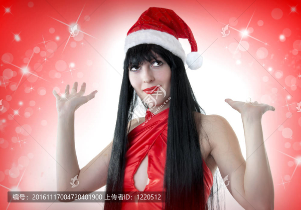 美麗的女人在圣誕老人的帽子