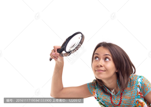 放大鏡的女人照片