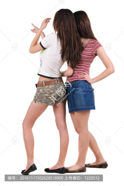 兩個年輕女性的后視圖。白色孤立。
