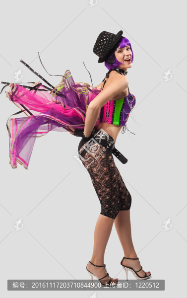 美女迪廳跳舞的女孩在顏色的緊身胸衣