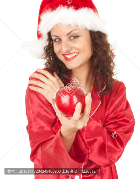 Santa女孩在紅色的圣誕帽子與紅蘋果；白色背景