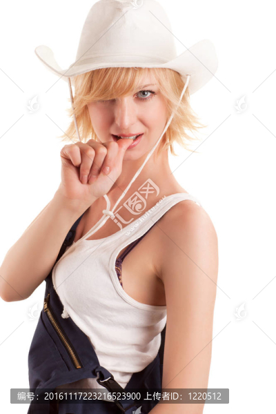 性感的女牛仔在一頂牛仔草帽