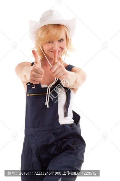 性感的女牛仔在一頂牛仔草帽