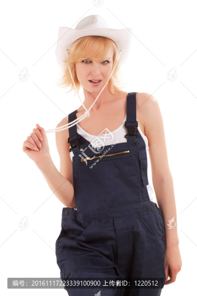 性感的女牛仔在一頂牛仔草帽