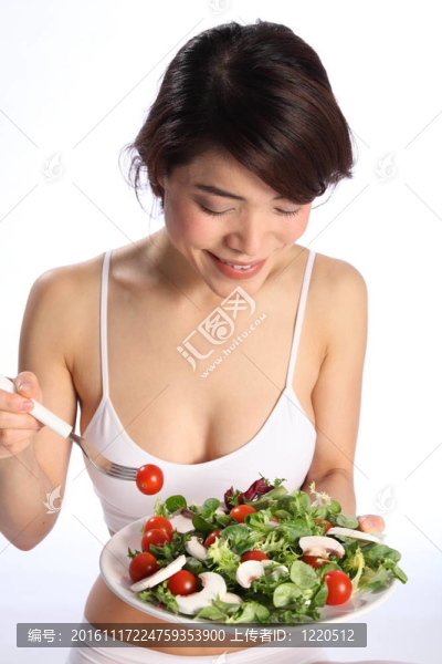 快樂日本女孩吃綠色